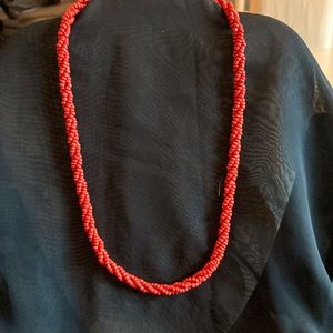Twisted red/orange bead 18” necklace resembles coral